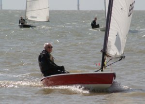 Veteran sailor Eddie White in his Comet