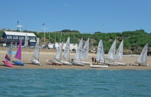 The dinghies being rigged on the beach