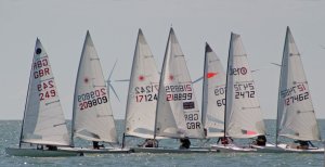 Simon Clarke leads the fleet to the first mark in his Europe