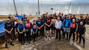 Commodore Richard Walker, in the check shirt, with some of the Regatta competitors (photo thanks - Colin N Waddell)