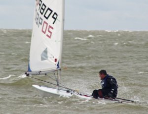 Winner of two races, and overall, Ken Potts in his Laser