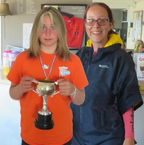 Belle is presented with the Topper Splash Trophy