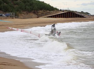 John Heath's Blaze hits the beach after capsizing