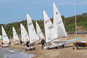 Helms rig their boats ready for the start of the race