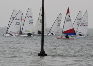 The start of the first race and the boats pass the Inner Distance Mark