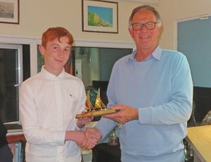 Cadet Finley Taylor is presented with the Personal PY Pursuit Race Trophy