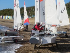 Boats rigged on the beach, ready for action