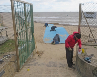 Laying the beach launch and recovery mats