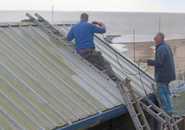 Jet washing the Clubhouse's roof