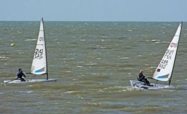 Tim Dye slips ahead of Andy Cornforth, both sailing RS Aeros