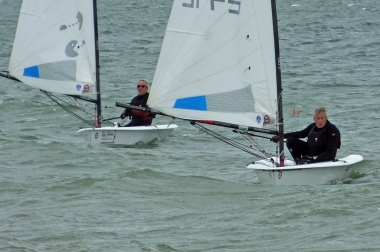 Brian Allen holds off Derroll Pedder, both in RS Aeros