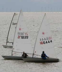 Father and son Andy and Jono Dunnett in their Lasers